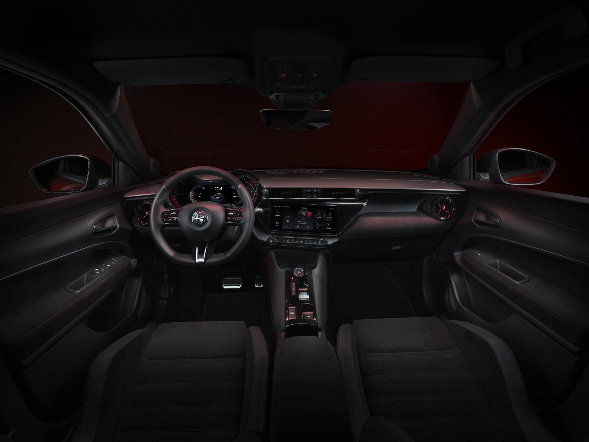 Detalle del cargador inalámbrico en la consola central.