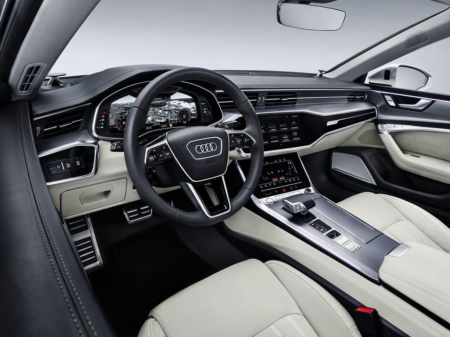 Interior de la cabina Audi A7, fusión de confort y tecnología avanzada.