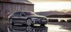 Audi A8 posando lateralmente con un reflejo en agua, destacando su diseño elegante. Audi A8 posando lateralmente con un reflejo en agua, destacando su diseño elegante.