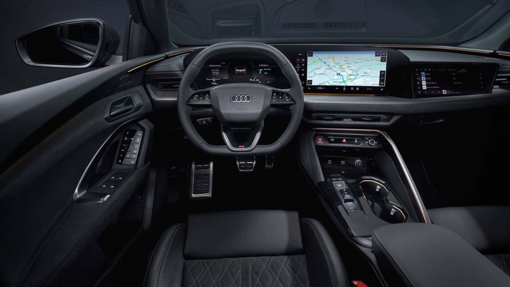 Vista de los asientos delanteros del Audi Q5, resaltando su ergonomía y acabados.