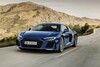 Audi R8 capturado en movimiento, mostrando su dinamismo y diseño vanguardista. Audi R8 capturado en movimiento, mostrando su dinamismo y diseño vanguardista.