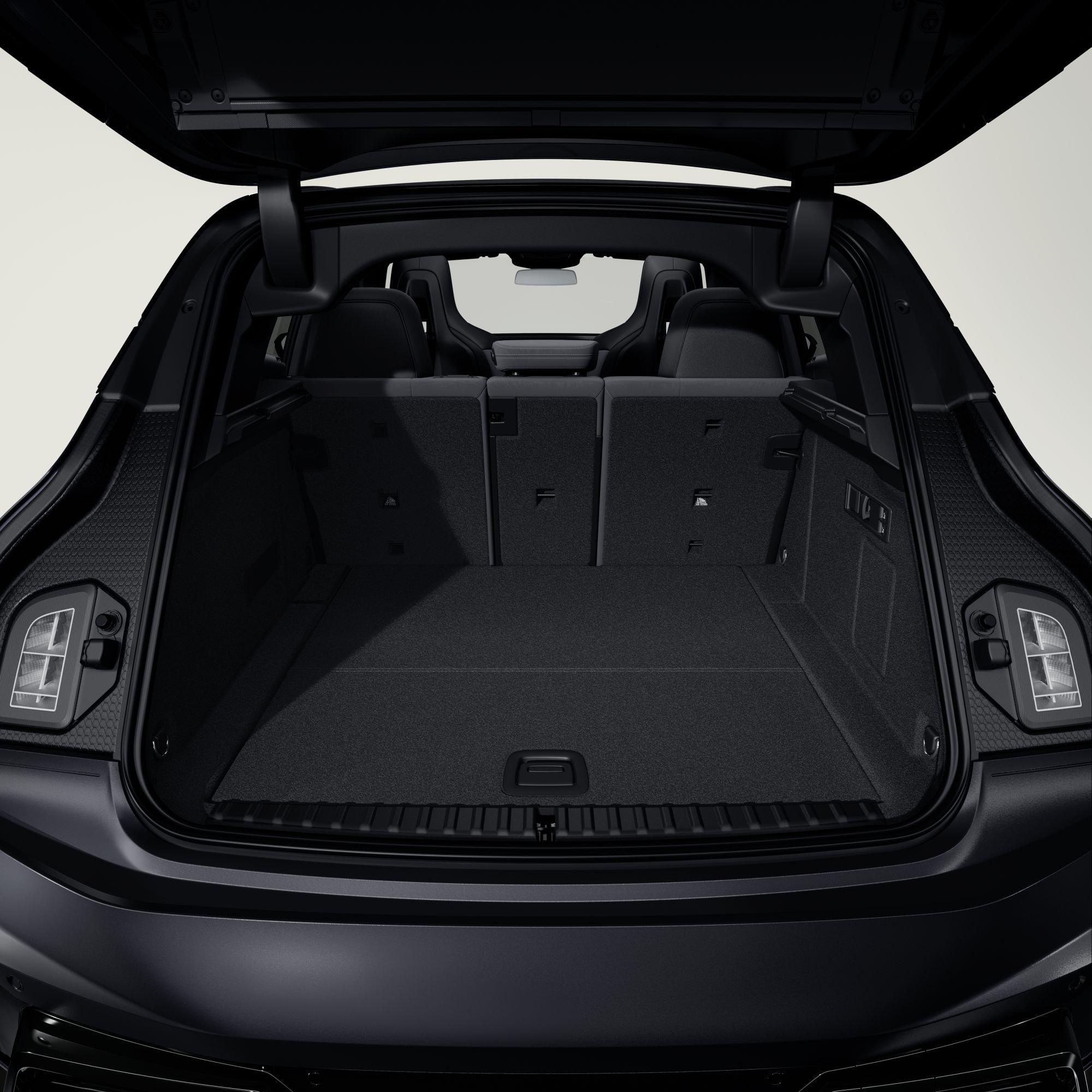 Asientos traseros del BMW iX, espaciosos y cómodos.