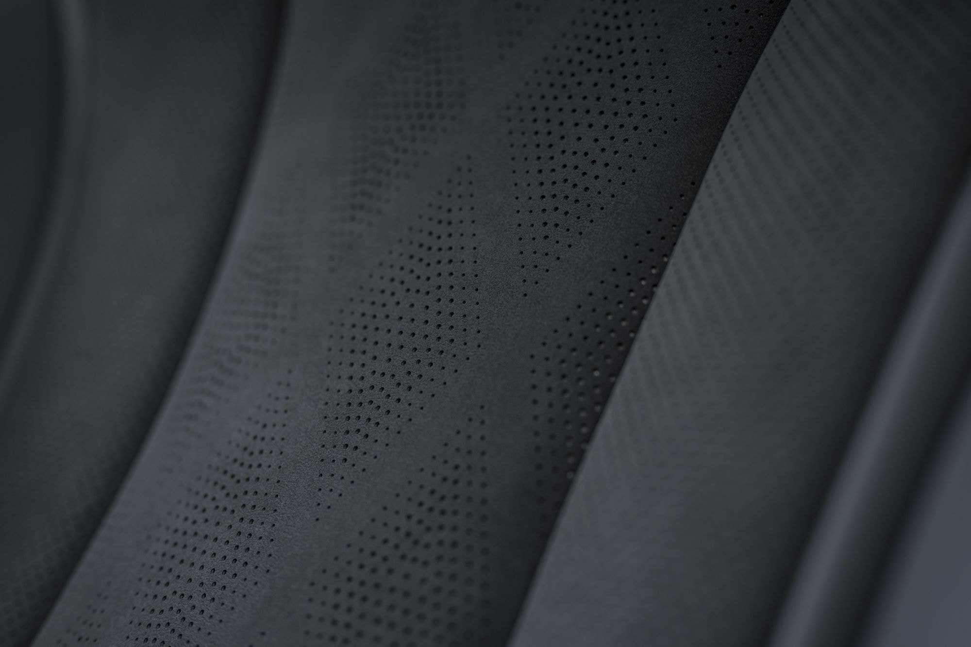 Textura de los asientos en diseño ergonómico, proporcionando comodidad.