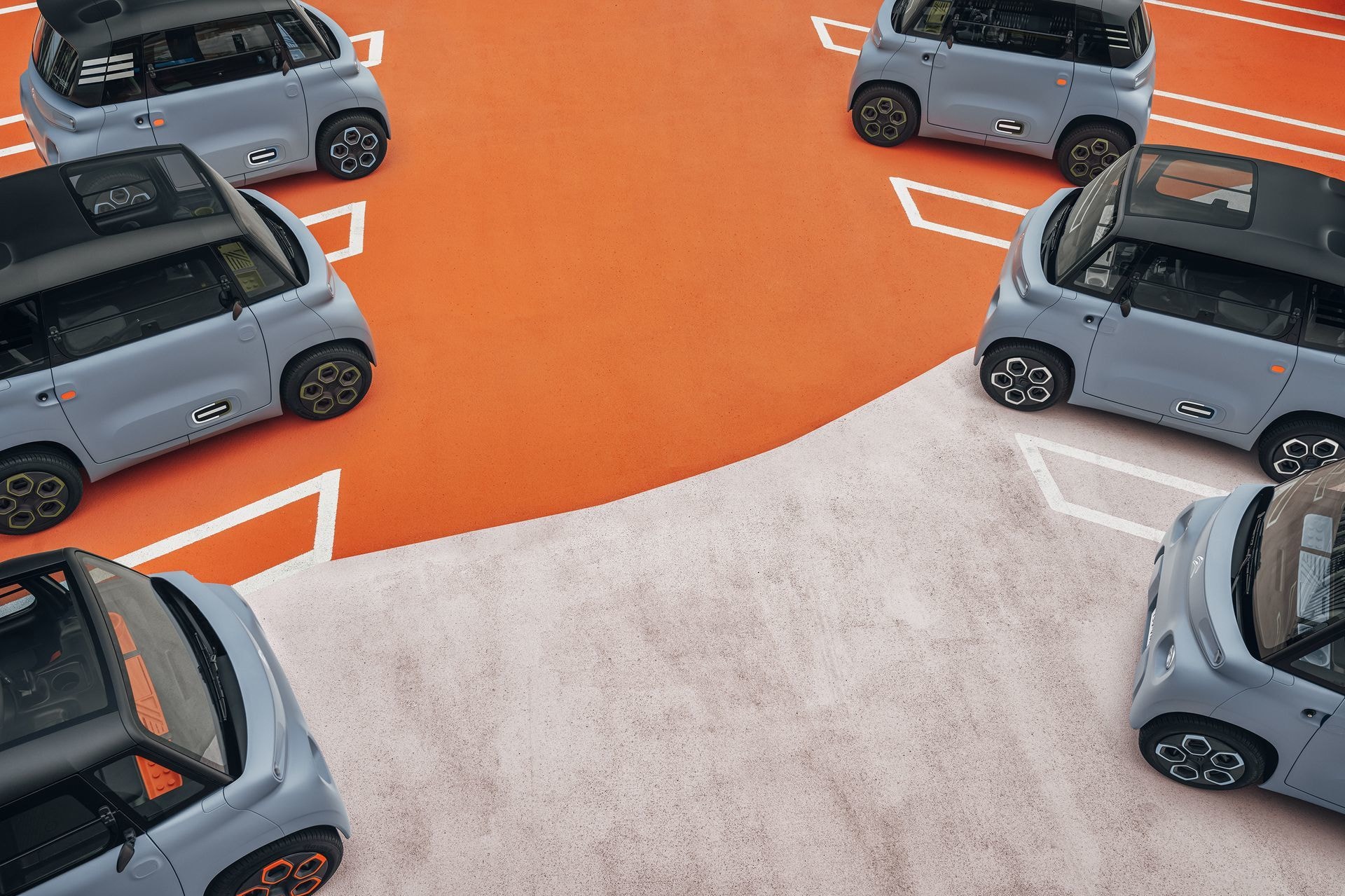 Imagen de una flota de Citroën AMI resalta su diseño uniforme y moderno.