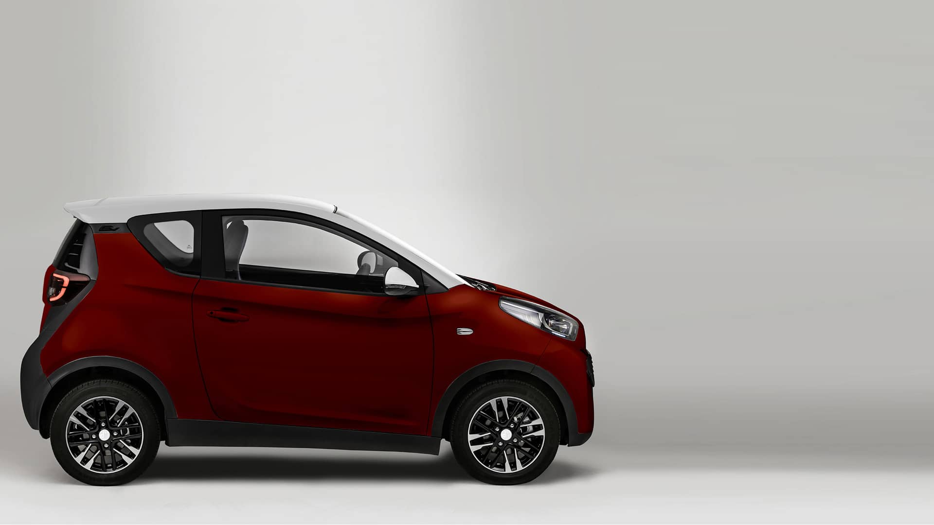 Perfil lateral que muestra las líneas aerodinámicas del DR 1.0 color rojo.