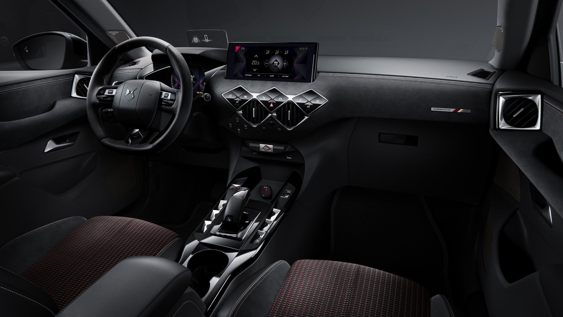 Vista del interior del DS 3 con tapicería en cuero en dos tonos, combinando elegancia y diseño contemporáneo.