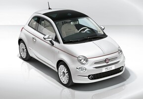 Vista angular delantera del Fiat 500C en estudio, destacando su diseño retro. Vista angular delantera del Fiat 500C en estudio, destacando su diseño retro.