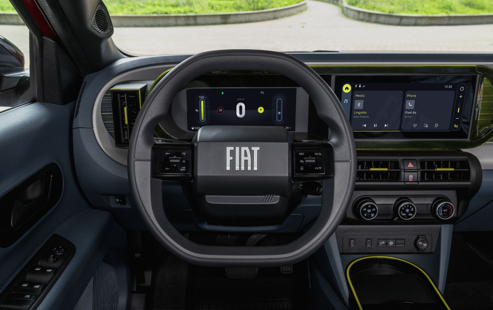 Vista de los asientos traseros del Fiat Grande Panda eléctrico, mostrando diseño.