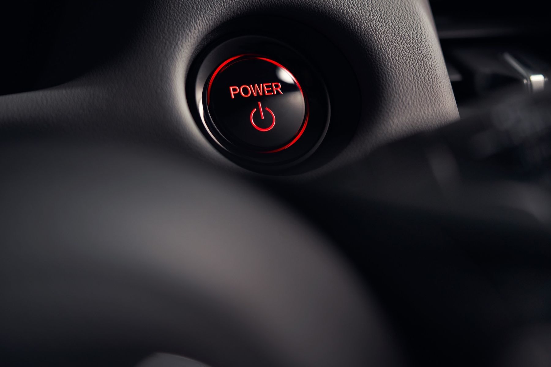 Botón para seleccionar el modo de conducción en el Honda Jazz híbrido.