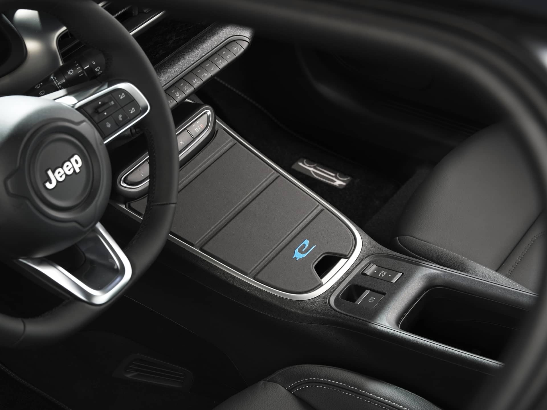 Consola central con selector de modos de conducción eléctrica