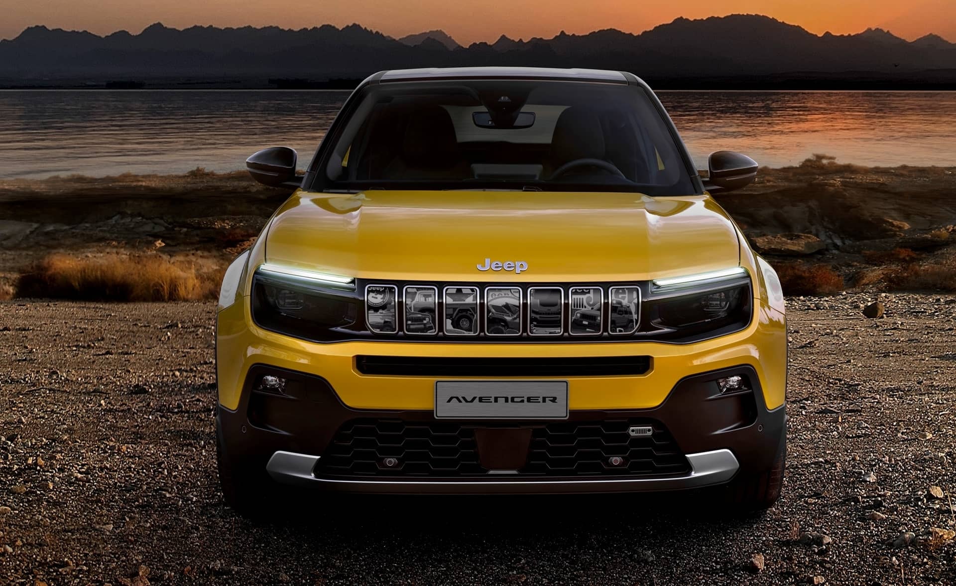 Vista frontal del Jeep Avenger destacando su parrilla y diseño robusto.