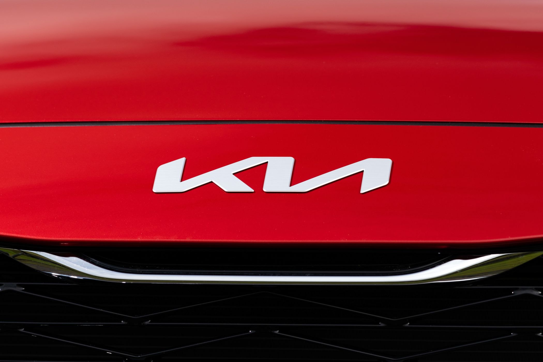 Tapizado del asiento con diseño moderno y detalles en negro.