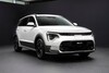 Fotografía del Kia Niro Híbrido en vista delantera y lateral. Fotografía del Kia Niro Híbrido en vista delantera y lateral.