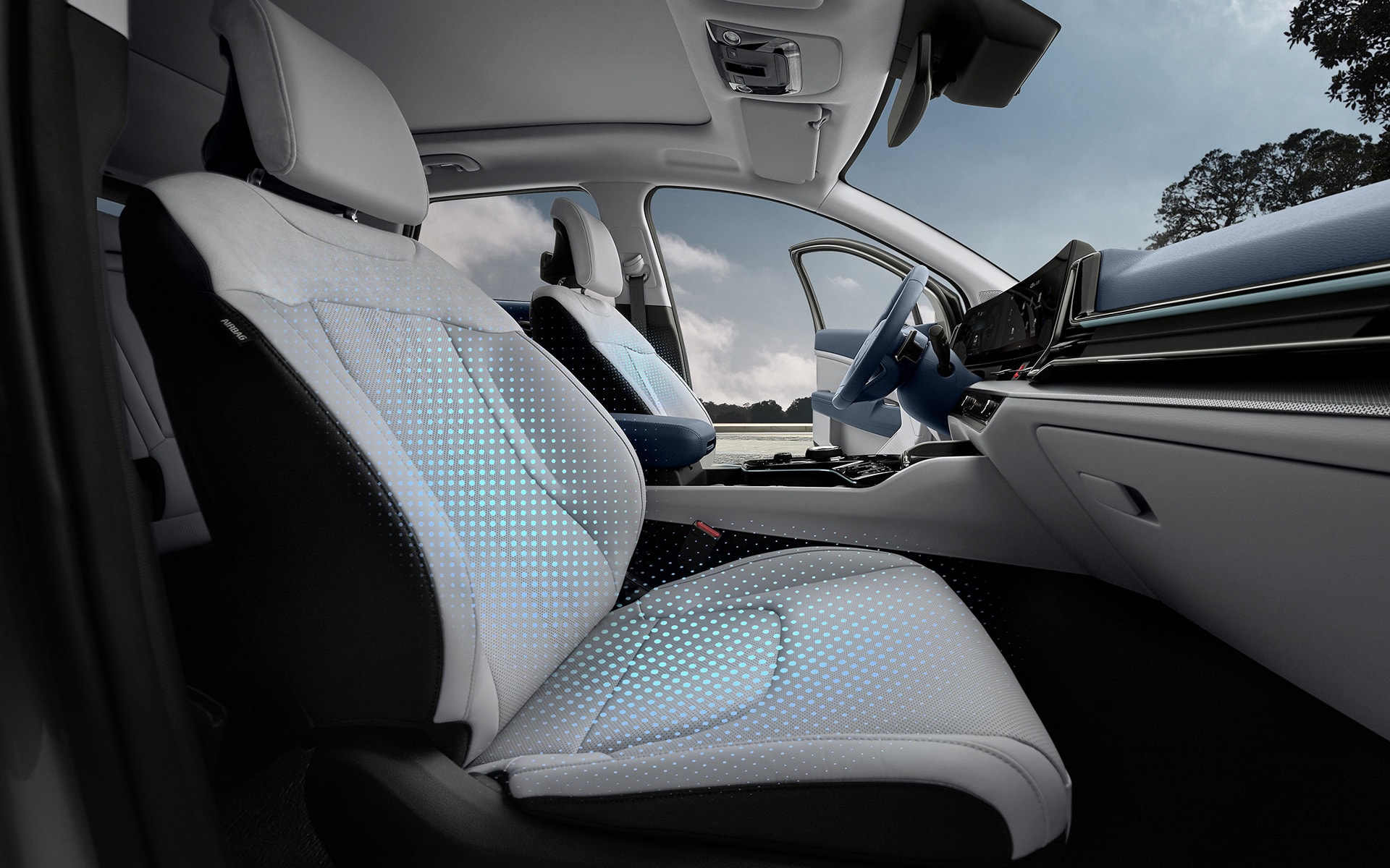 Interior del Kia Sportage con asientos de cuero y diseño ergonómico.