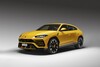 Vista lateral del Lamborghini Urus en color amarillo Vista lateral del Lamborghini Urus en color amarillo
