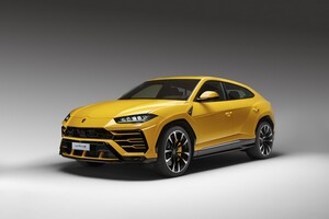 Vista lateral del Lamborghini Urus en color amarillo Vista lateral del Lamborghini Urus en color amarillo