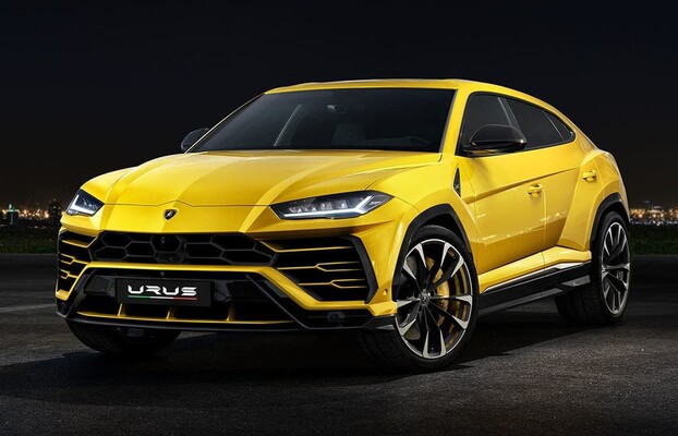 Imponente ángulo frontolateral del Urus en un tono amarillo vibrante Imponente ángulo frontolateral del Urus en un tono amarillo vibrante