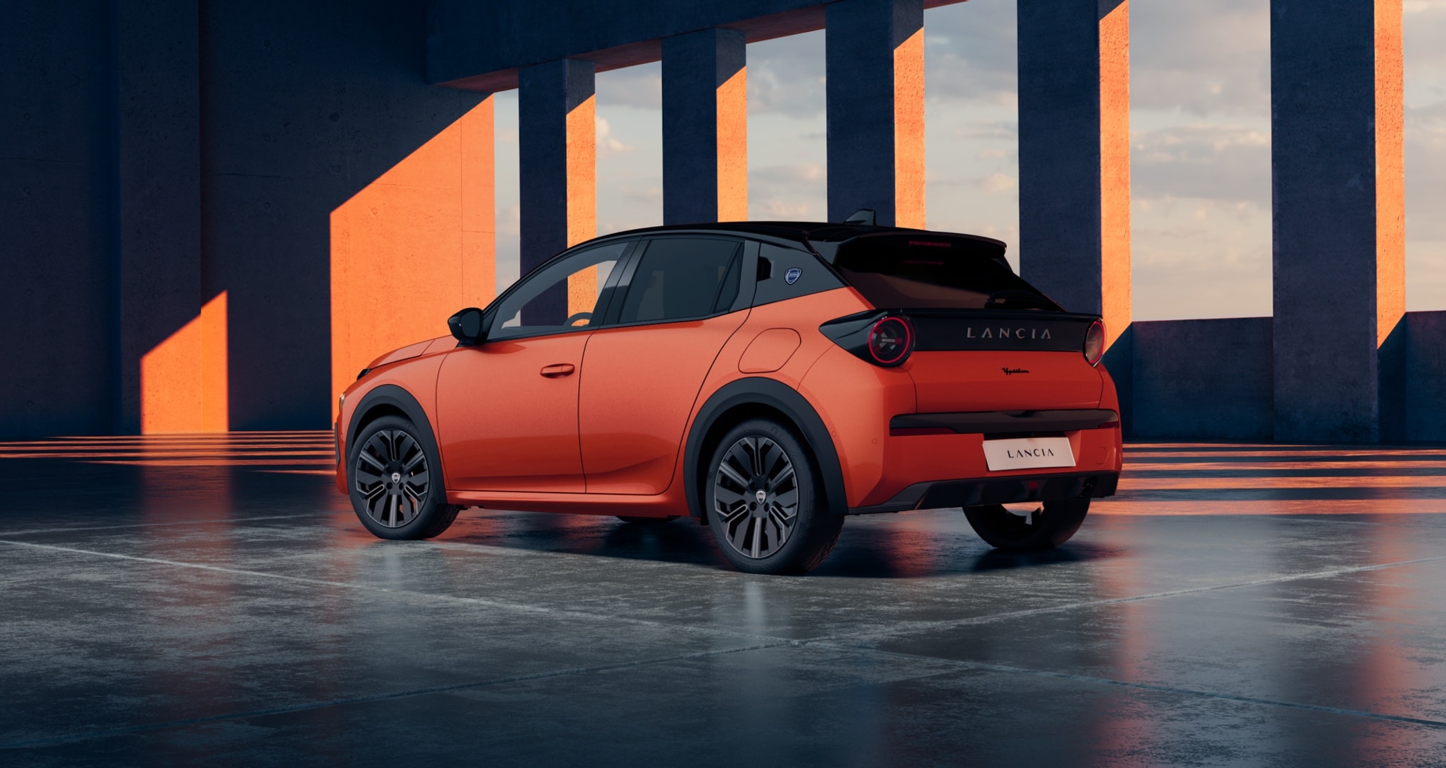 Perfil lateral del Lancia Ypsilon, mostrando su elegante y moderno diseño.