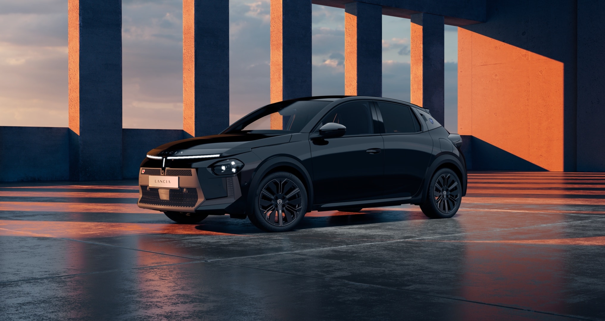 Vista lateral del Lancia Ypsilon en color negro, destaca su diseño sofisticado.