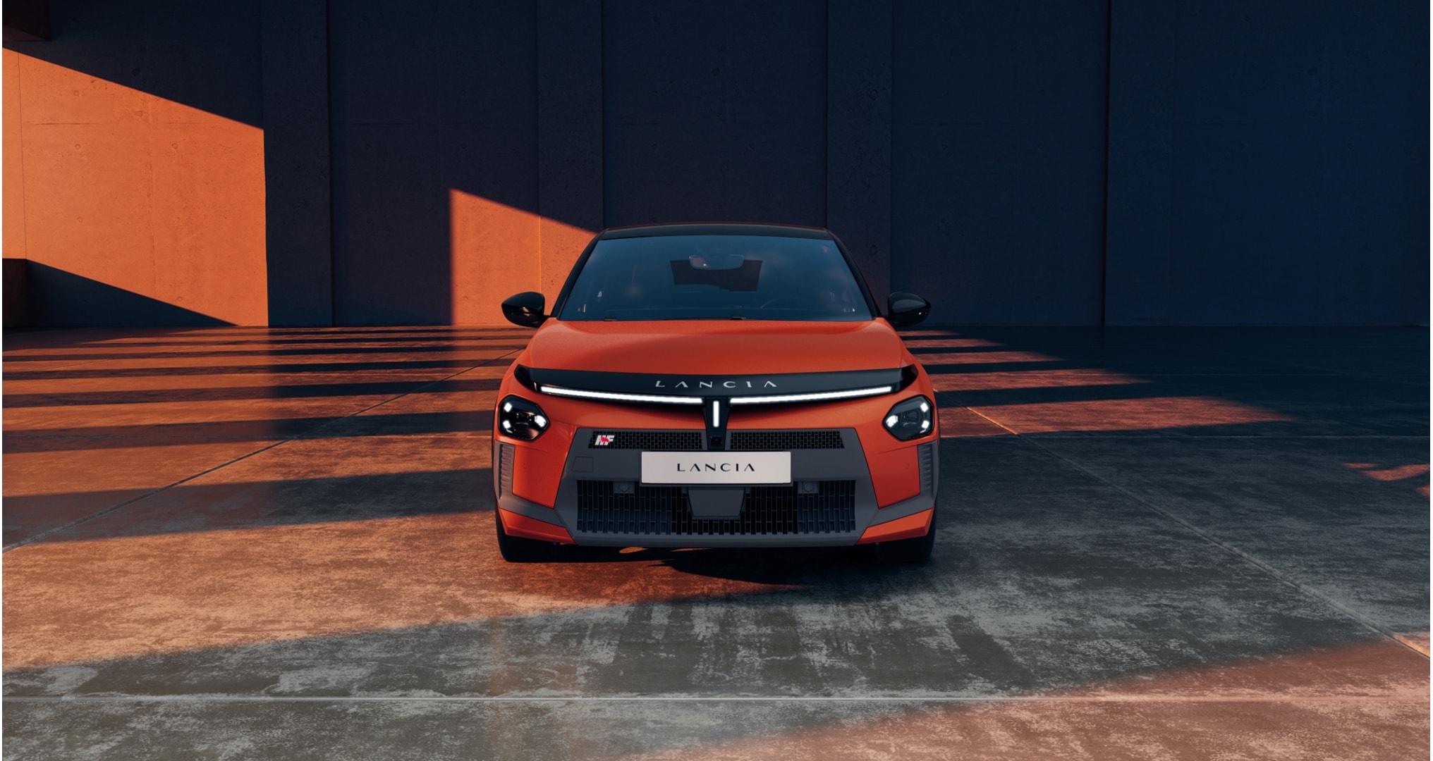 Vista trasera del Lancia Ypsilon, destacando su estilo dinámico y características.