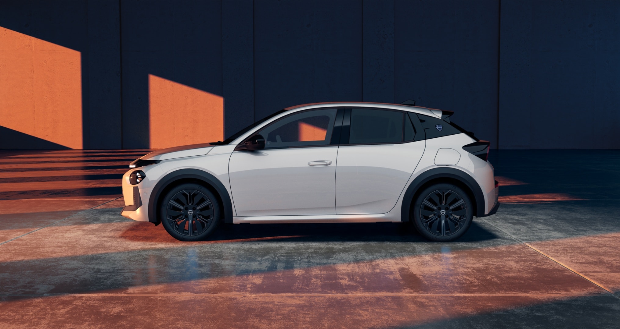 Vista trasera del Lancia Ypsilon negro, muestra su elegancia y estilo.