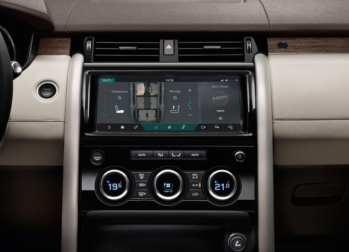 Detalle de la consola central con selector de marchas giratorio y teclas de modo de conducción.