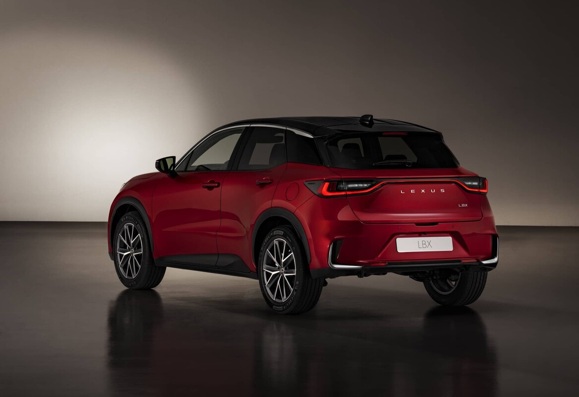 Close rear view of the Lexus LBX in red emphasizing the taillights design and the shape of the boot. Close rear view of the Lexus LBX in red emphasizing the taillights design and the shape of the boot.