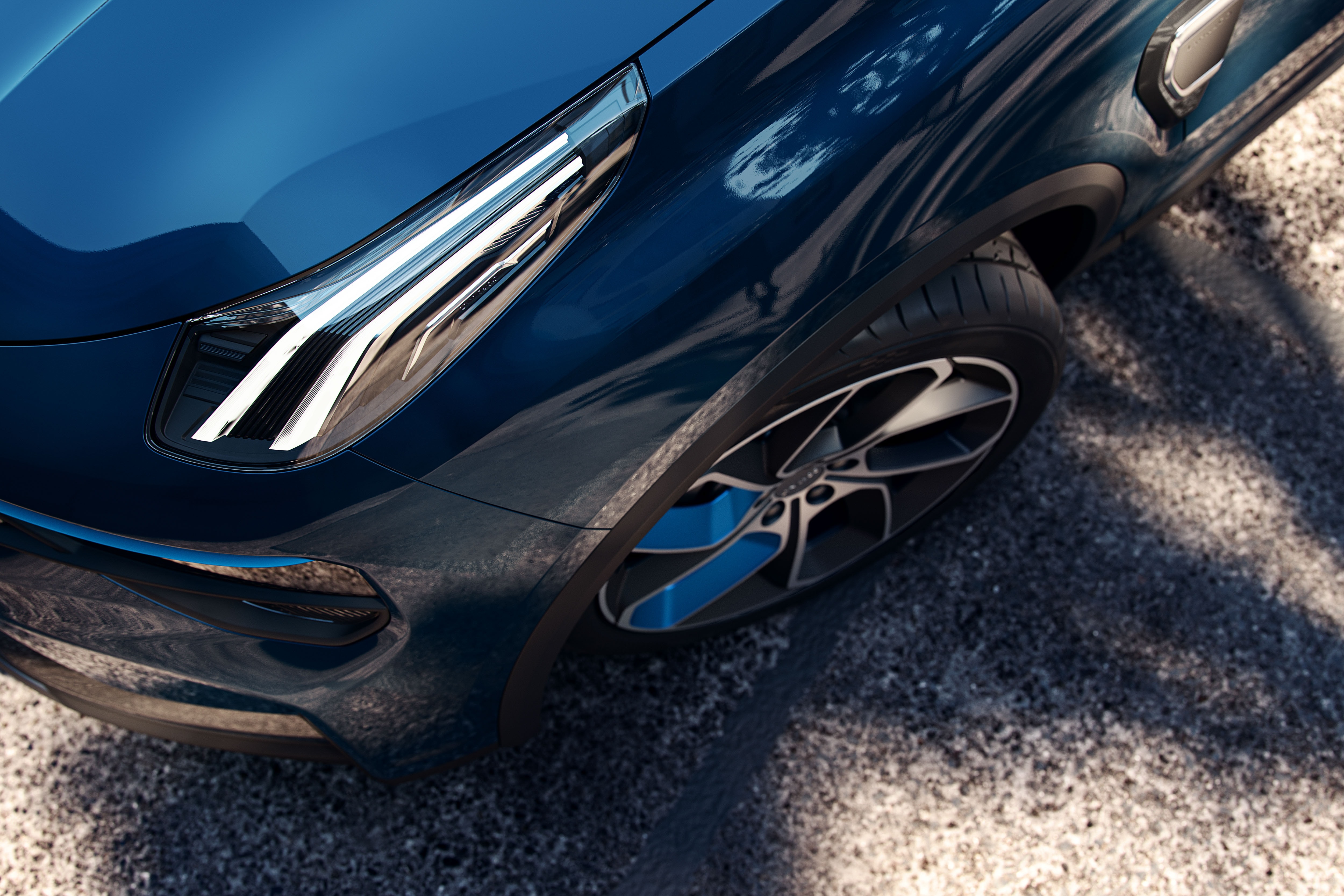 Imagen que muestra las llantas y un detalle de las luces delanteras del Lynk & Co 01.