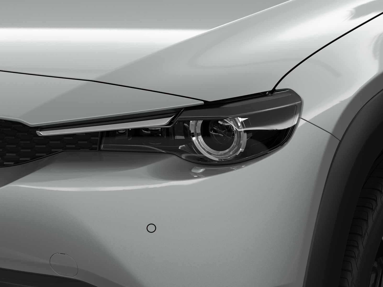 Detalle de la manija de puerta del Mazda MX-30, diseño funcional y elegante.