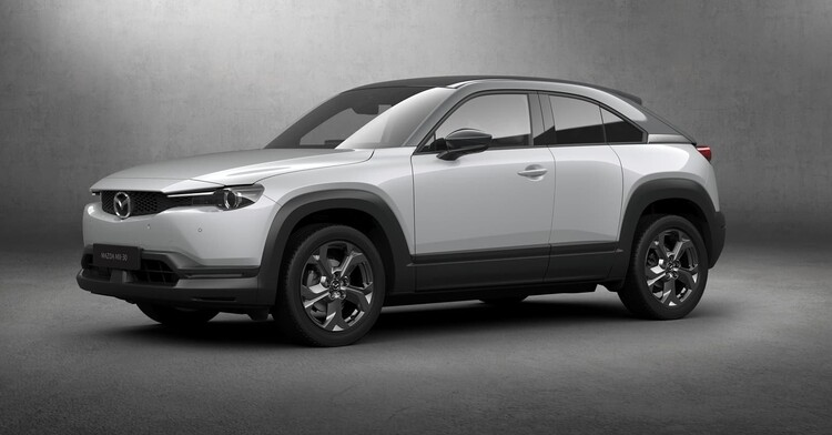 Perfil del Mazda MX-30 destacando su diseño limpio. Perfil del Mazda MX-30 destacando su diseño limpio.