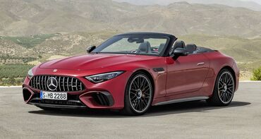 Vista lateral delantera del Mercedes-AMG SL en color rojo, destacando su parrilla agresiva. Vista lateral delantera del Mercedes-AMG SL en color rojo, destacando su parrilla agresiva.
