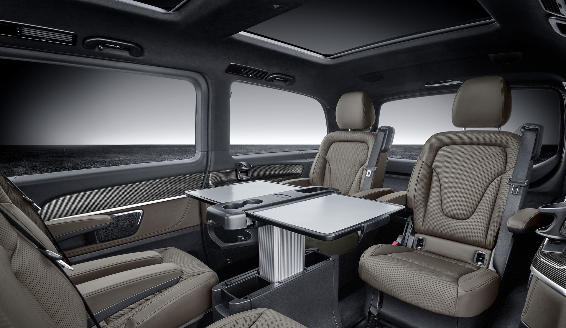 Sistema de mesa plegable entre asientos traseros de la Clase V.