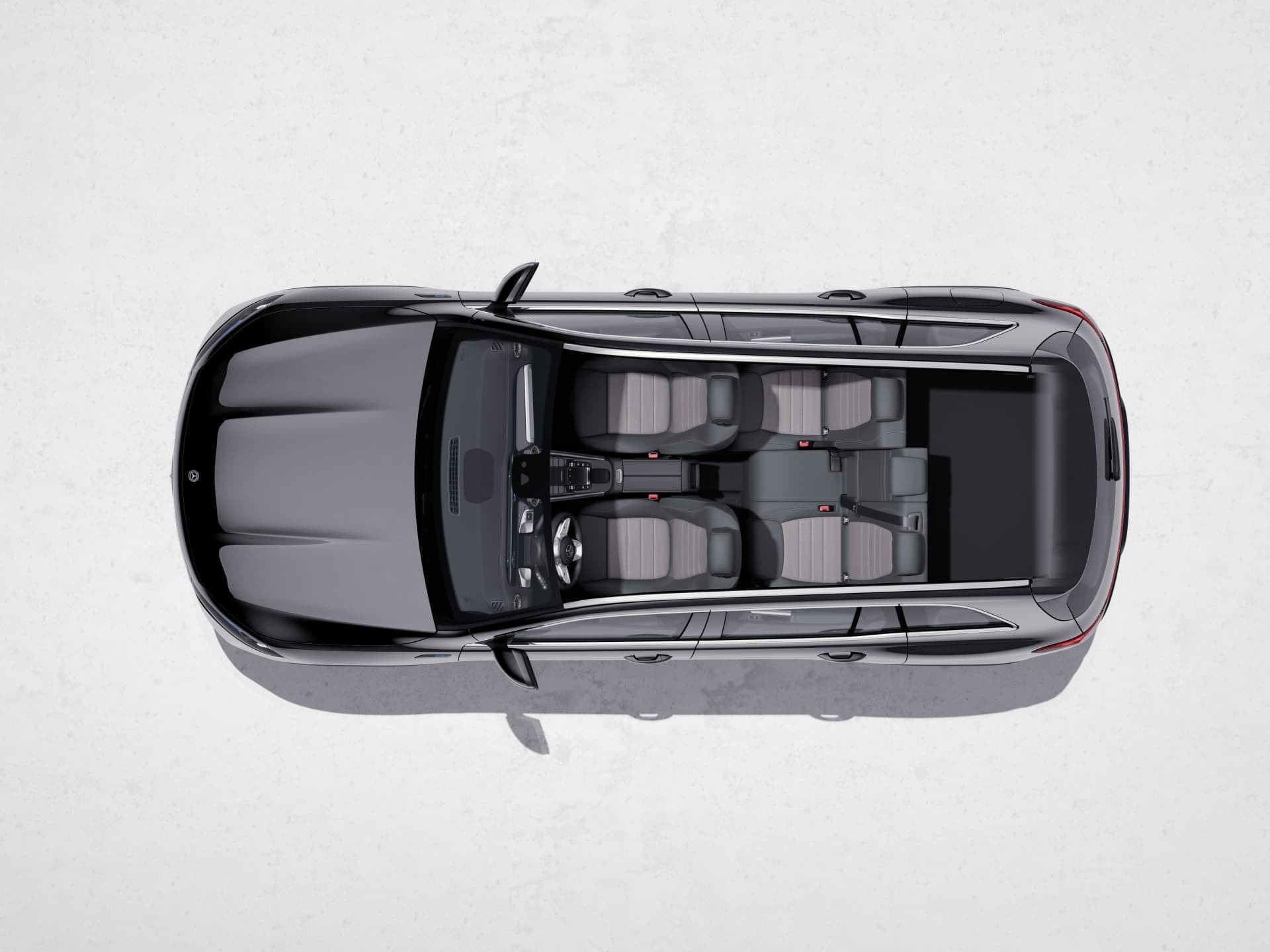 Perspectiva aérea del Mercedes EQB subrayando su amplitud y distribución de asientos.