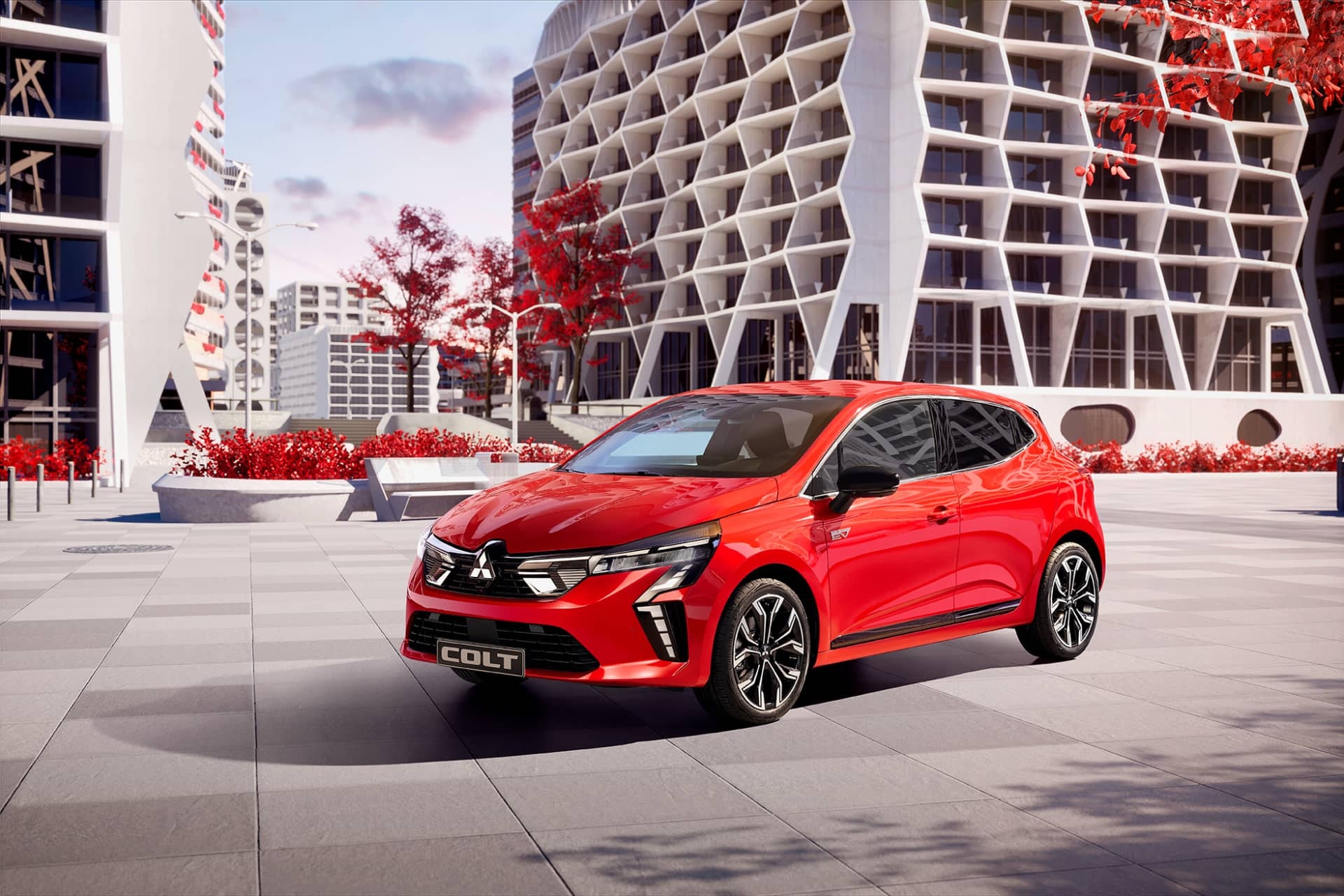 Perspectiva lateral y frontal del Mitsubishi Colt en ambiente urbano.