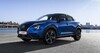Vista trasera lateral del Nissan Juke híbrido, destacando su diseño dinámico. Vista trasera lateral del Nissan Juke híbrido, destacando su diseño dinámico.