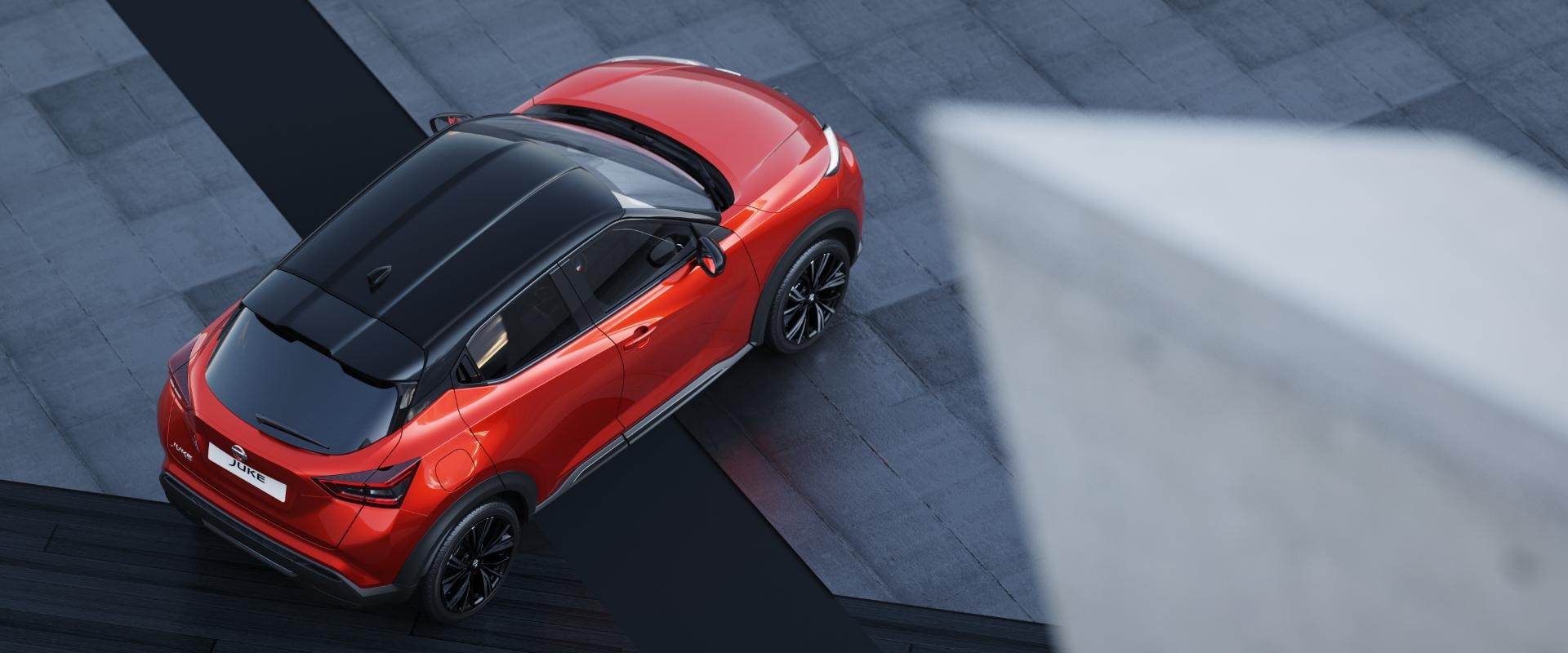 Vista aérea resaltando el techo y líneas laterales del vehículo.