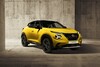 Vista lateral del Nissan Juke, mostrando su línea de diseño y llantas. Vista lateral del Nissan Juke, mostrando su línea de diseño y llantas.