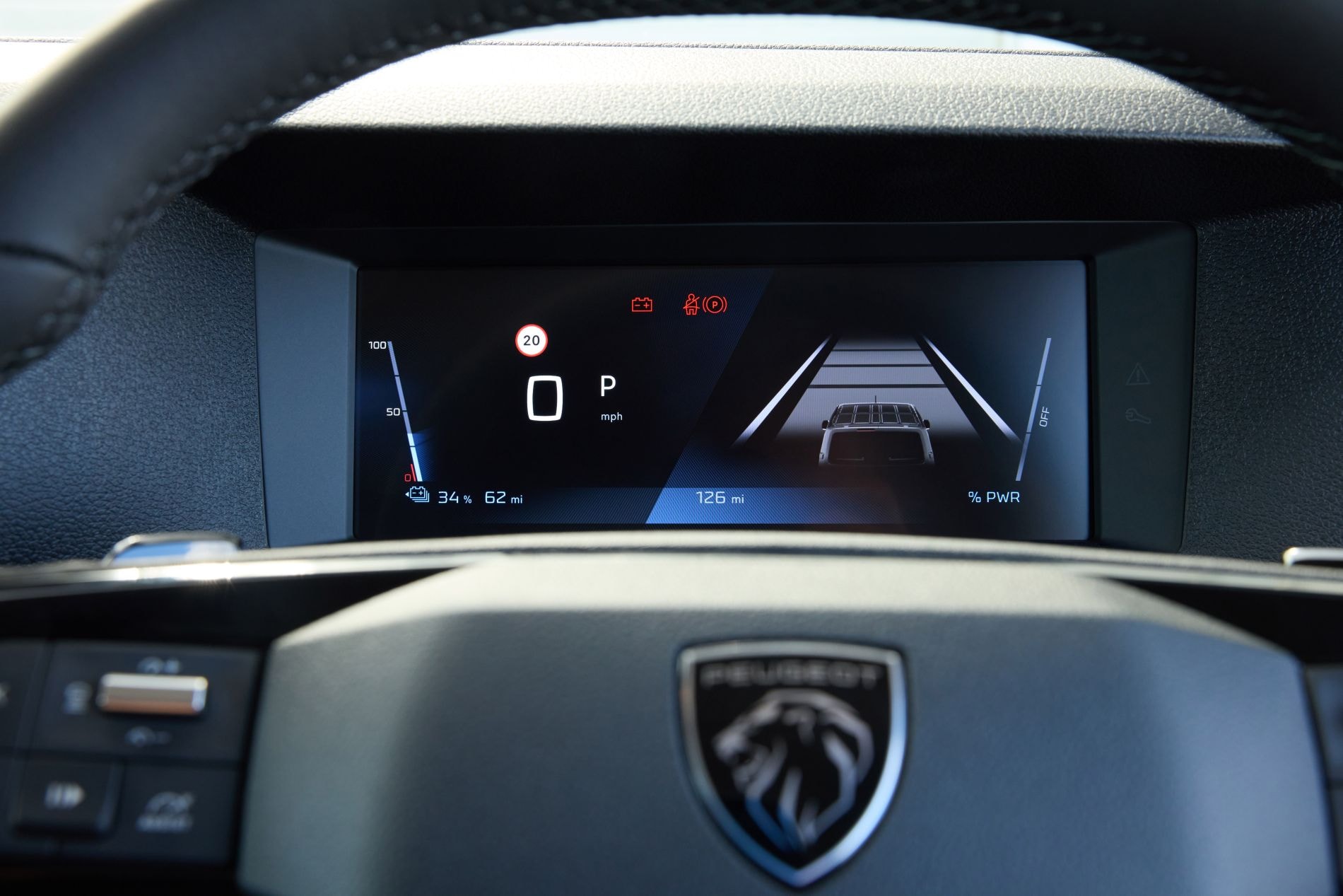 Controles de conducción en la consola central del vehículo.