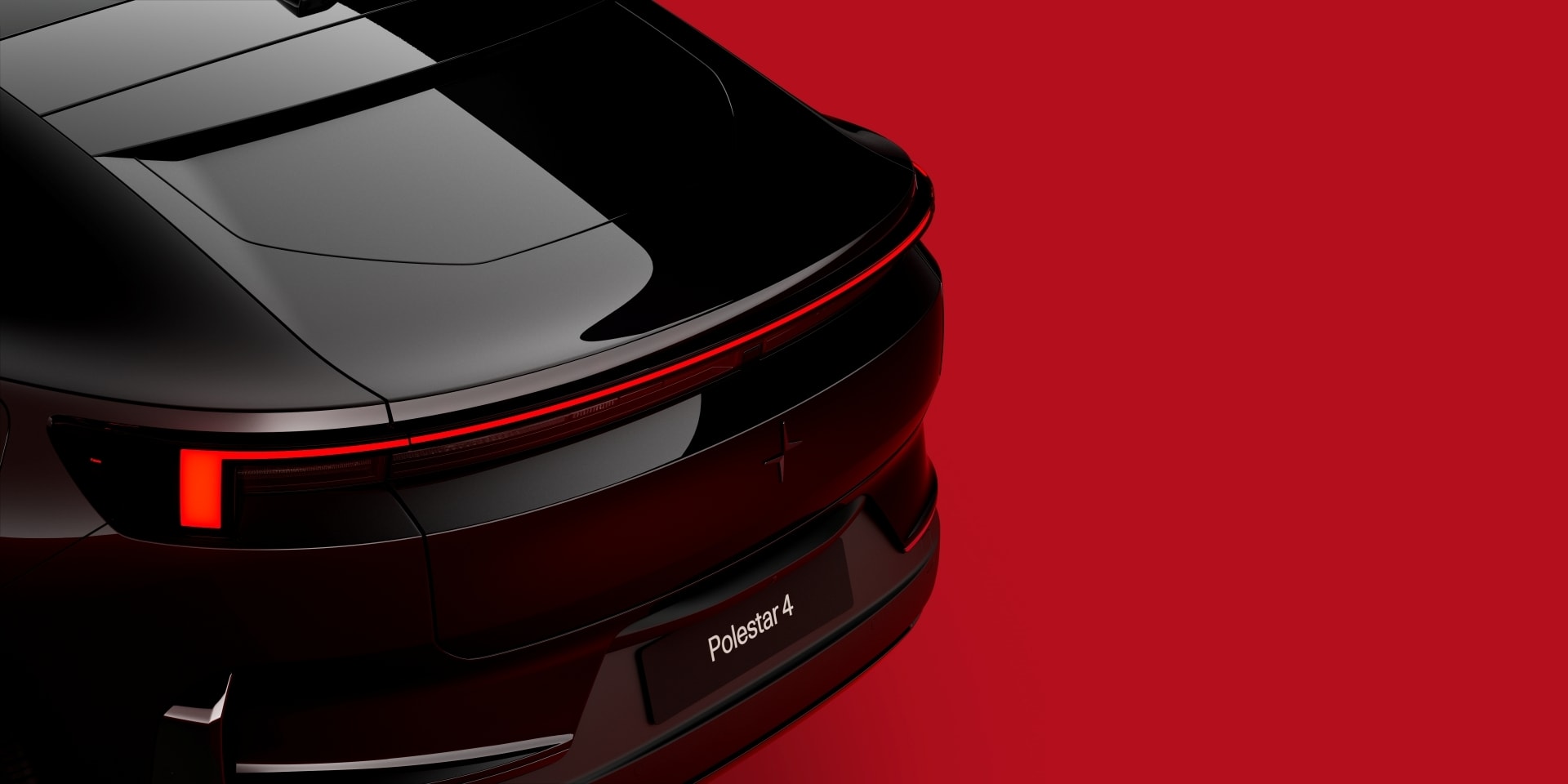 Trasera con techo de vidrio destacando pilares y spoiler.