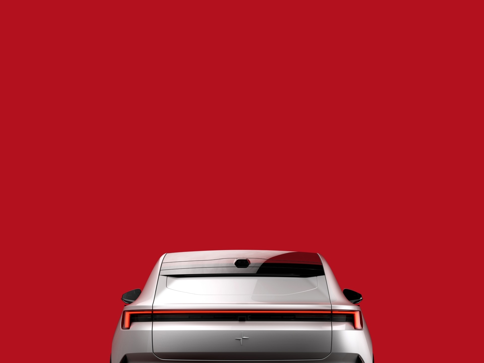 Imagen parcial de la trasera del Polestar 4, con énfasis en la luneta y alerón.