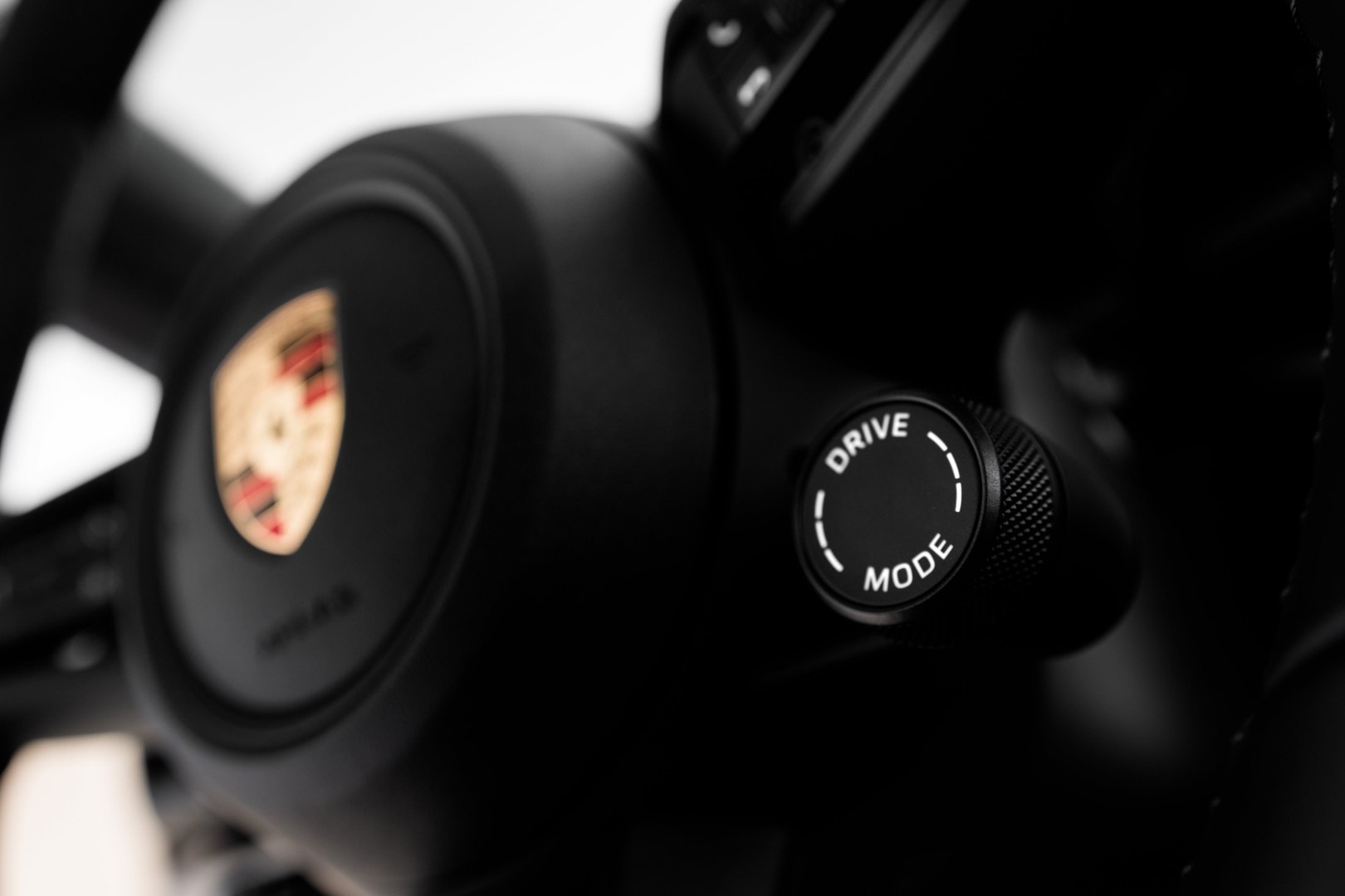 Selector de modo de conducción de Porsche Macan, un vistazo a su ergonomía y tecnología.