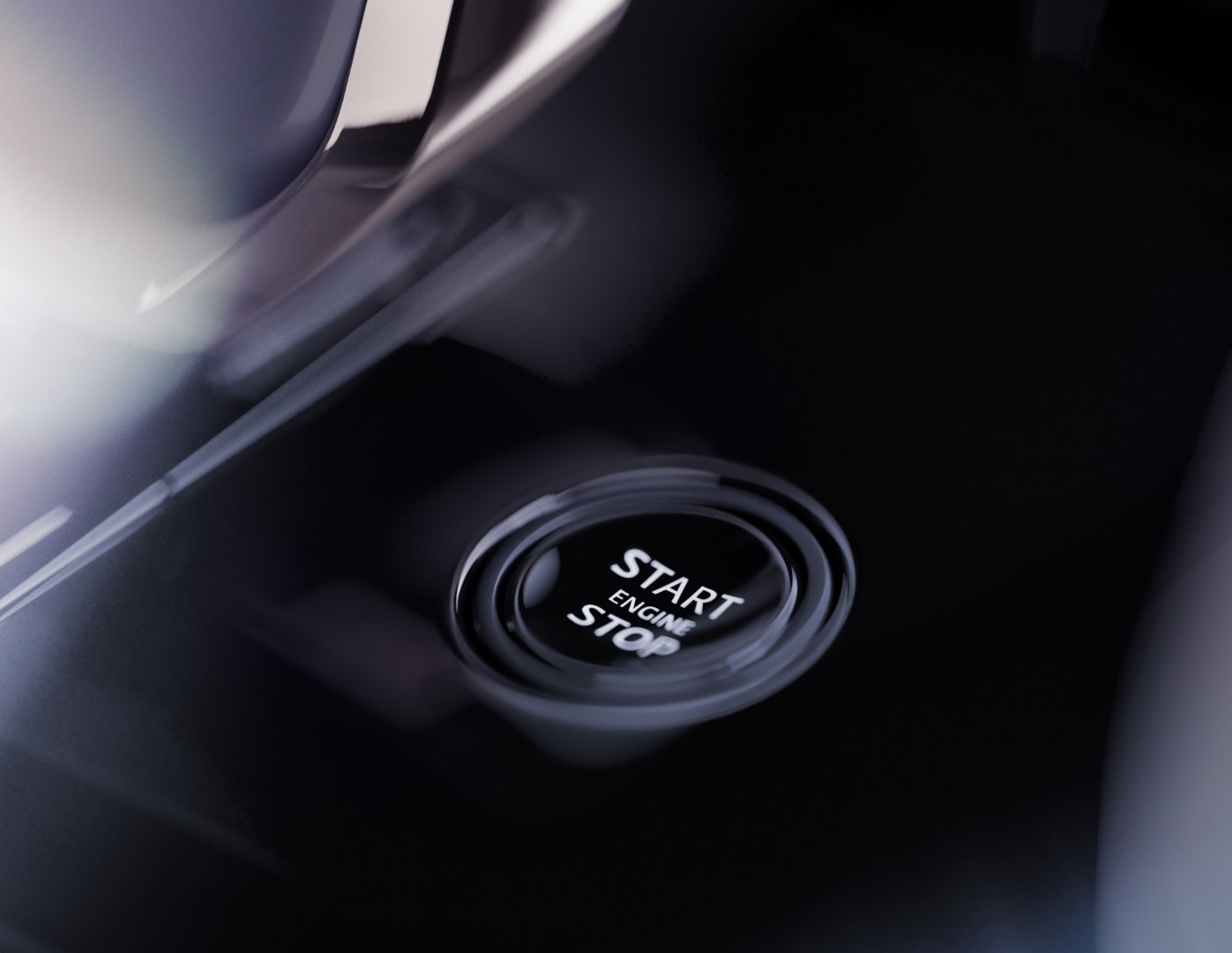 Imagen del botón de arranque y parada del motor.