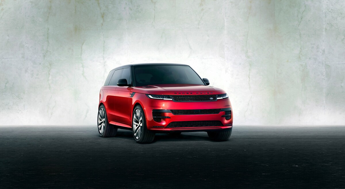Vista dinámica del Range Rover Sport en color rojo. Vista dinámica del Range Rover Sport en color rojo.