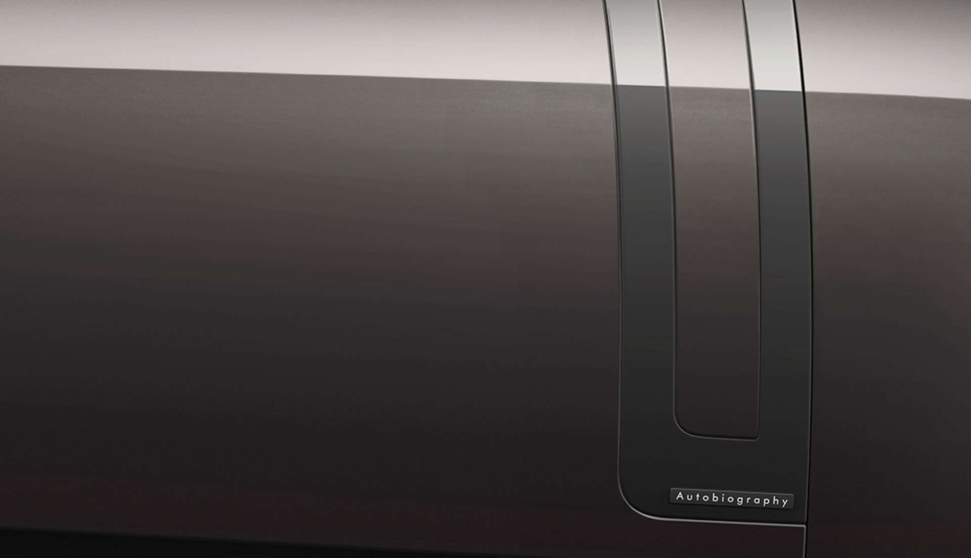 Detalle del distintivo 'Autobiography' en el lateral de un Range Rover.