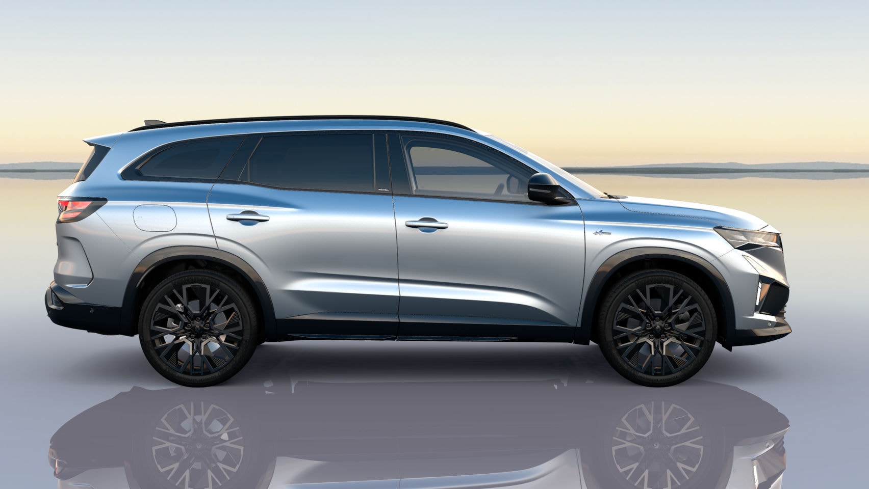 Frontal del Renault Espace, resaltando su parrilla y faros estilizados.