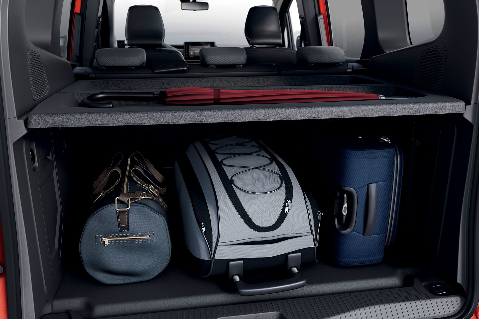 Maletero del Kangoo Combi con ejemplo de organización de equipaje.