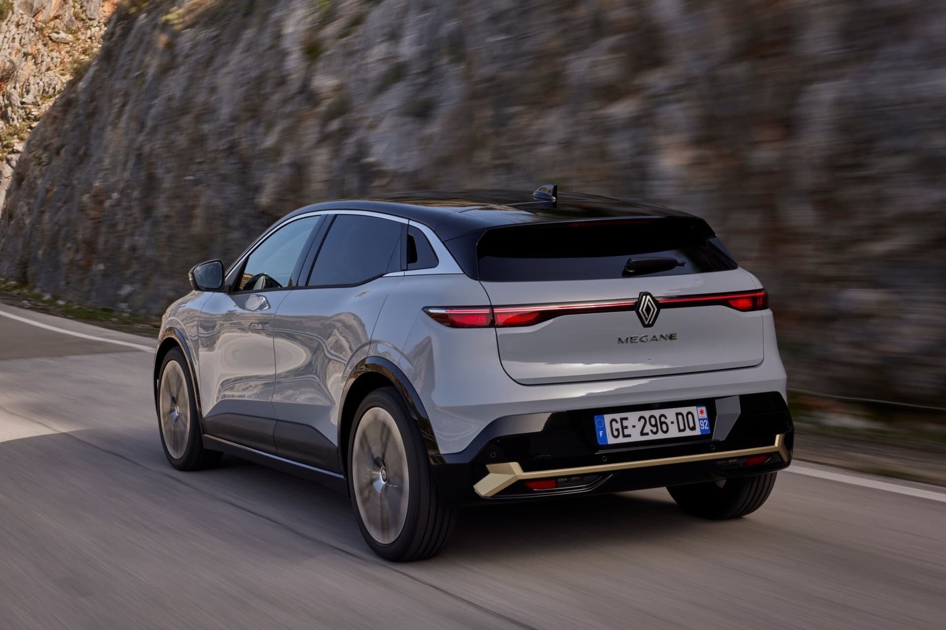 Rear view of the Renault Mégane E-Tech electric showcasing tail lights.