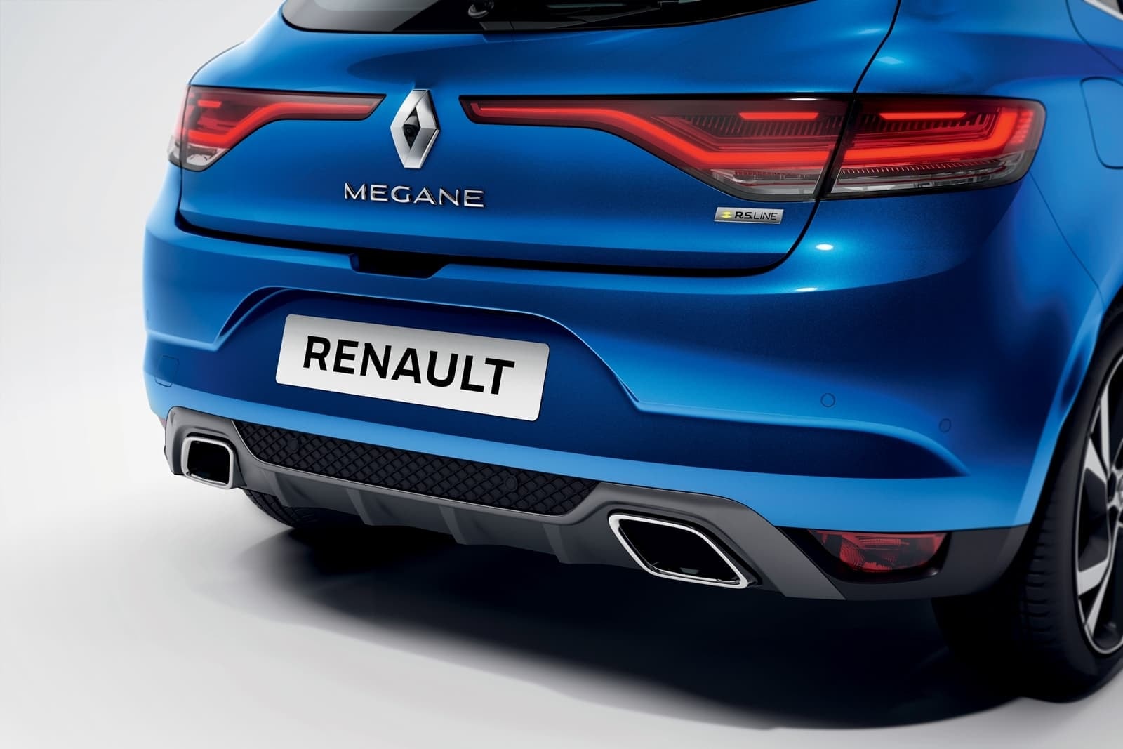 Trasera del Renault Mégane en tono azul vibrante destacando su diseño y dinamismo.