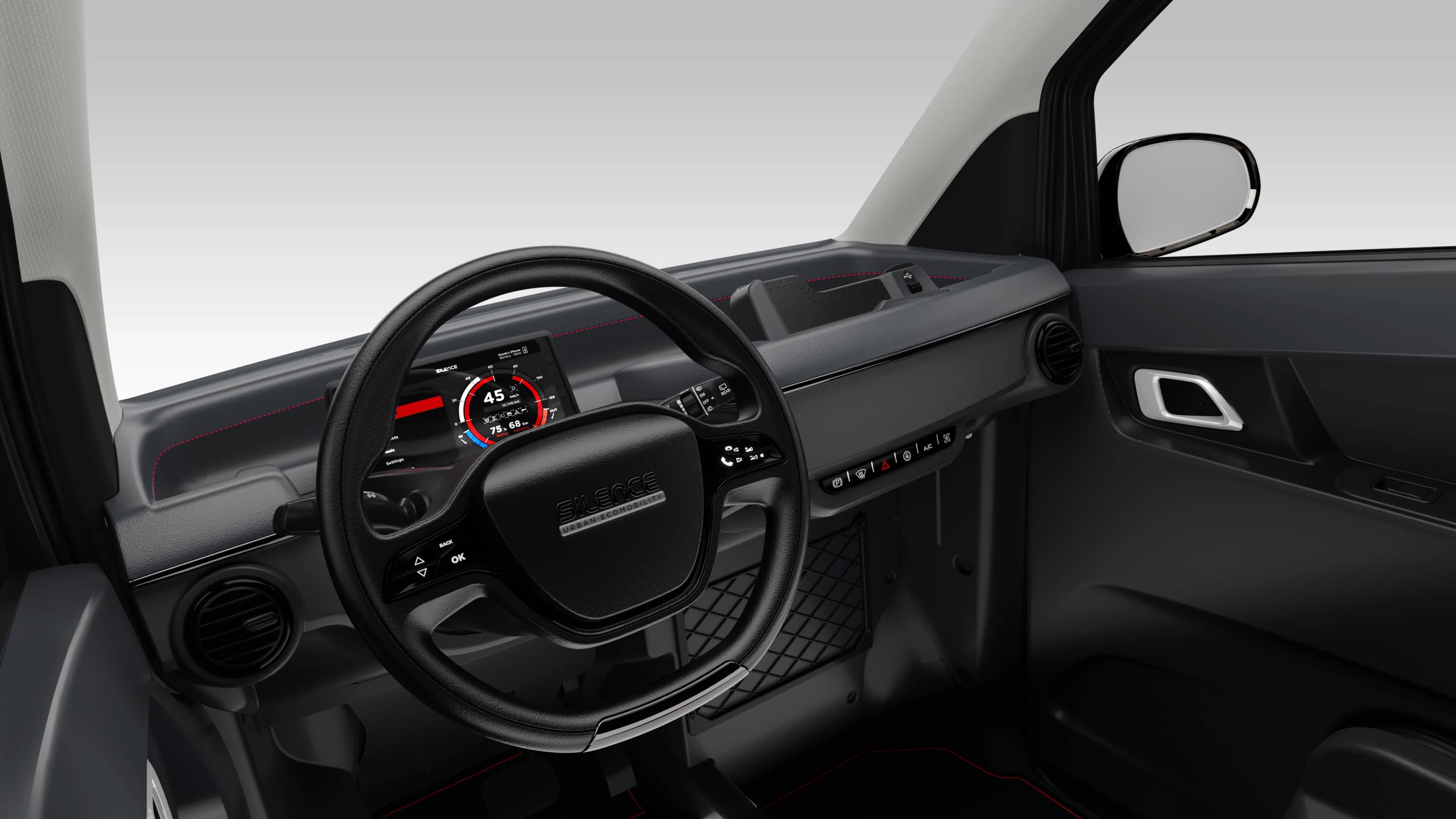 Cabina del Silence S04 mostrando volante y panel de instrumentos.