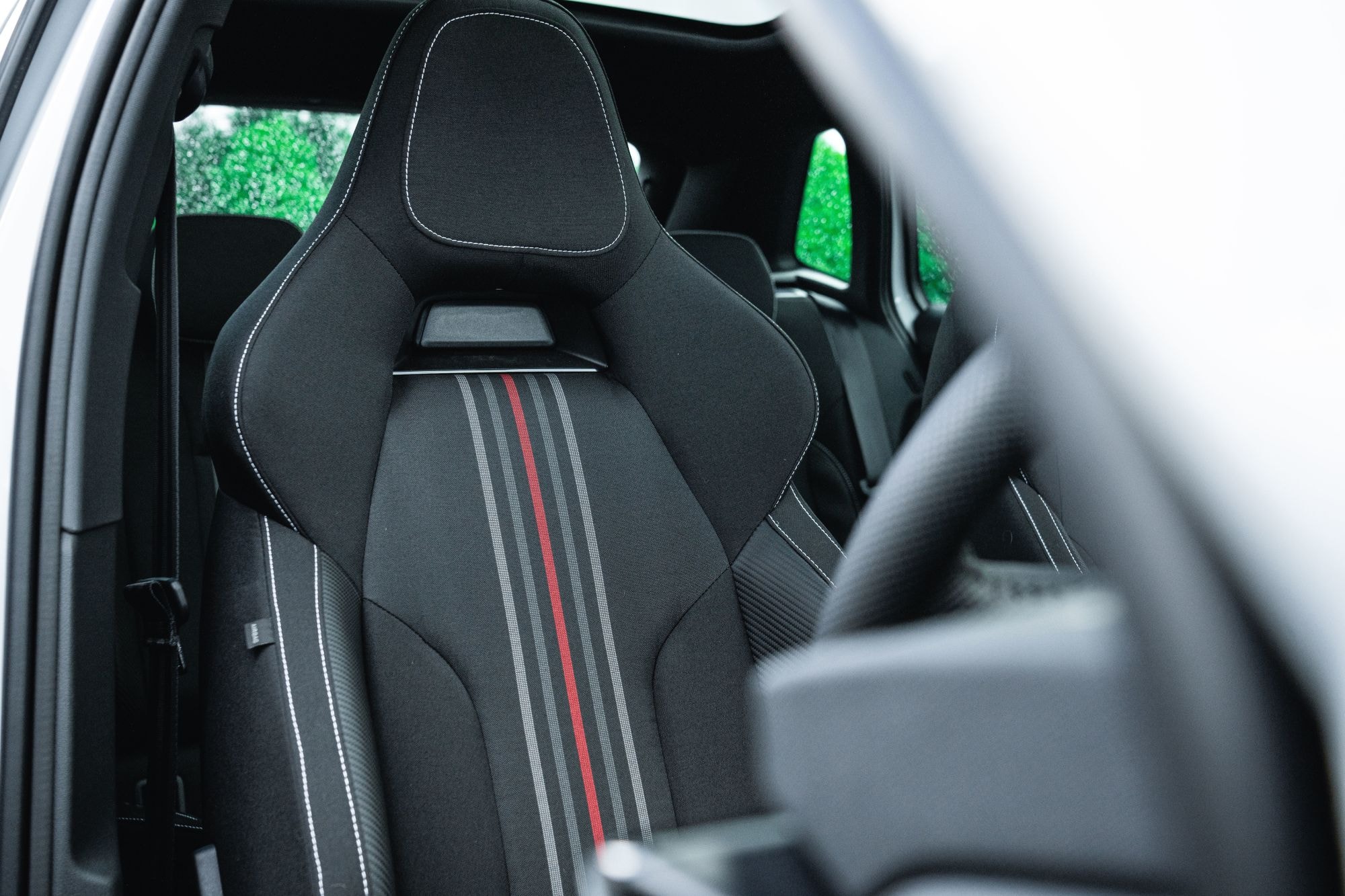 Botón para apertura del maletero, accesible desde el interior.